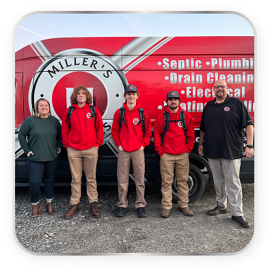 people in front of a work van