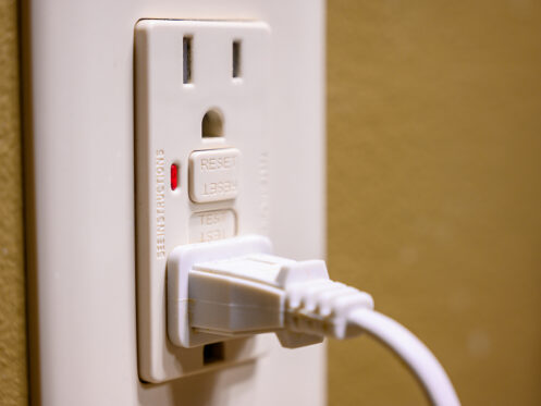 Outlet with a cord plugged in