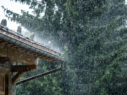 Downpouring rain on a roof