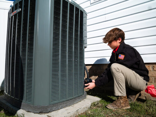 Miller's services performing maintenance on an A/C unit
