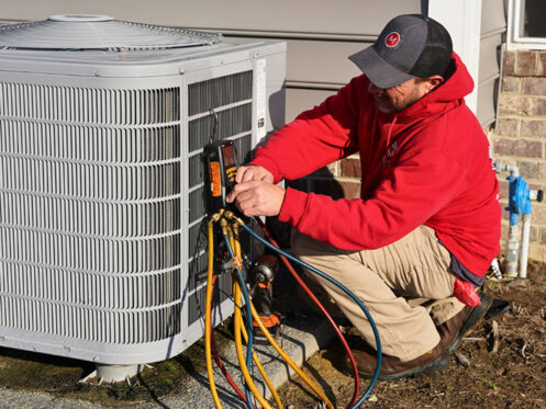 Miller's services performing maintenance on an A/C unit