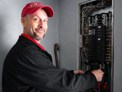 Miller's services electrician servicing electrical panel