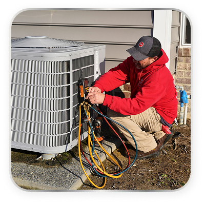 tech working on an hvac unit