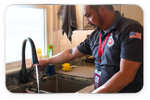 kitchen faucet turned on