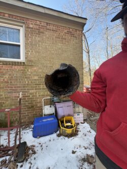 Closeup of corroded sewer pipe